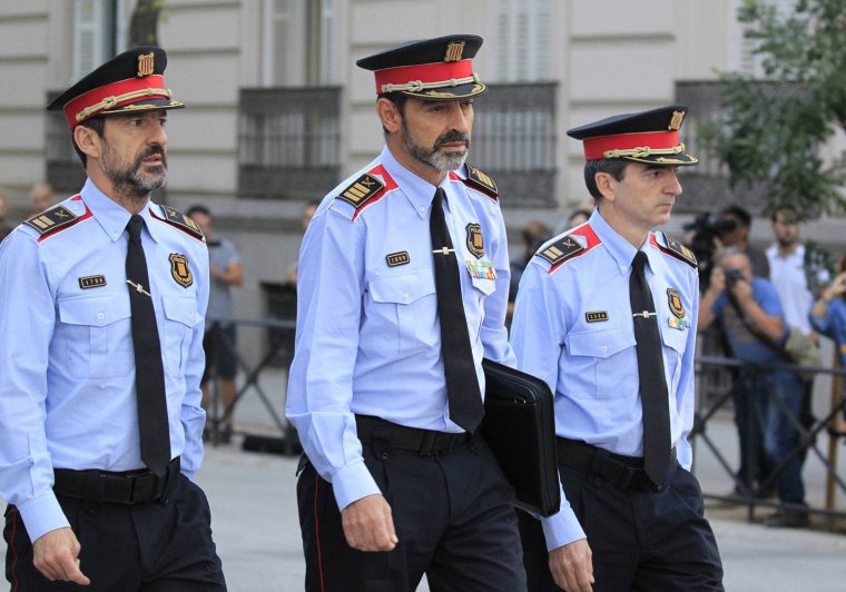 Els comissaris López i Molinero amb el major Trapero al centre, a Madrid.