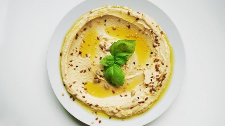 Consistency and final presentation of chickpea hummus.