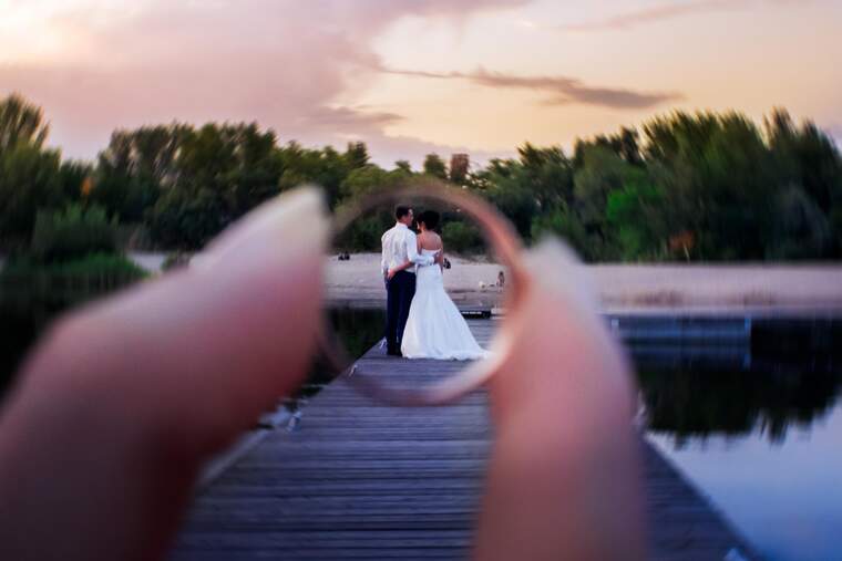 Wedding couple inside a wedding ring