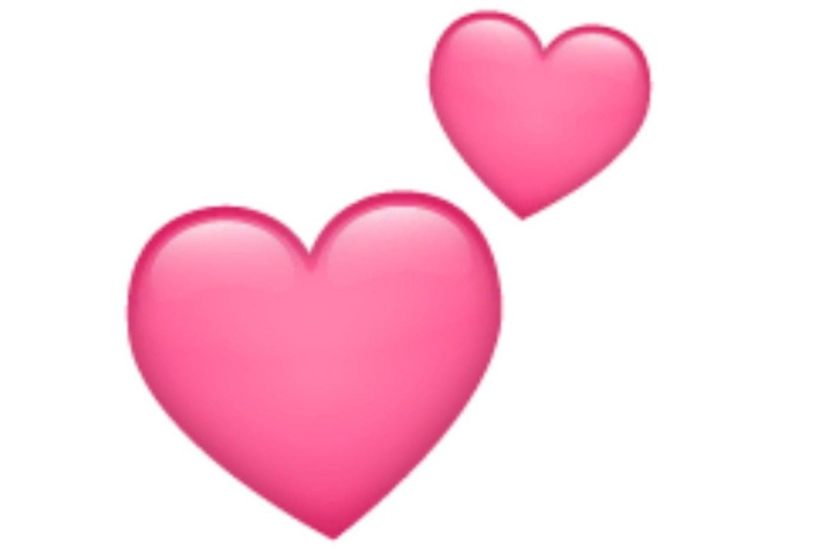 Emoji de dos corazones flotantes