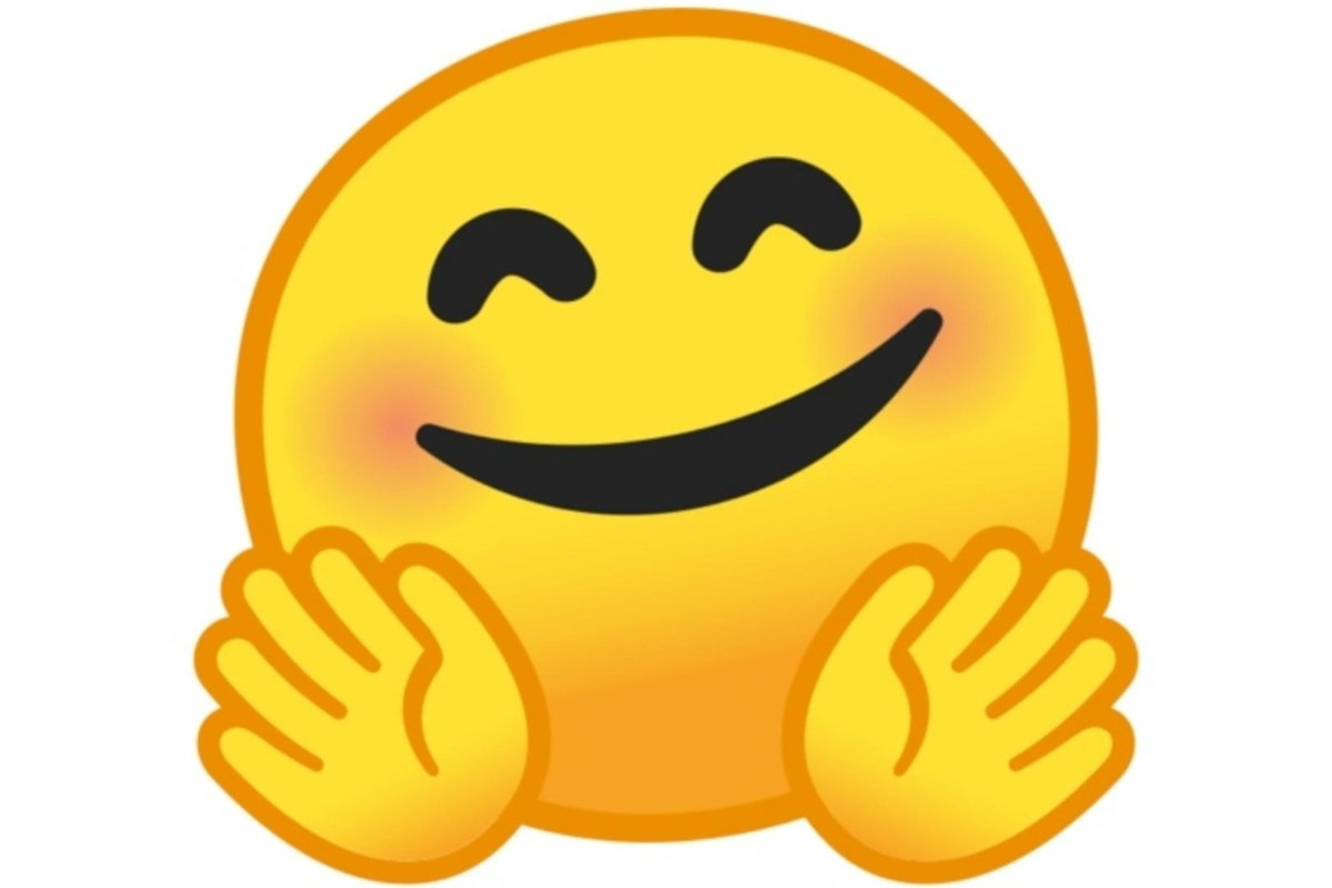 Emoji sonrojado y mostrando las manos