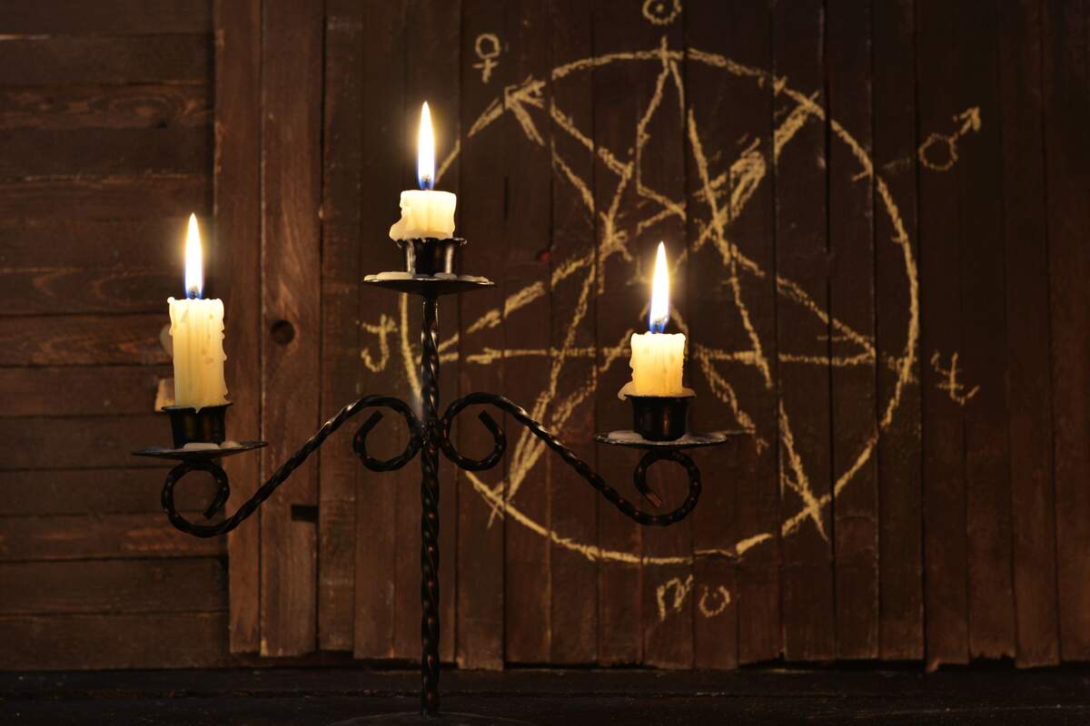 Pentagram and candles for a ritual