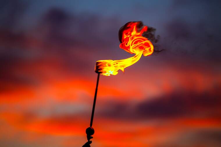 Fire torch and the sunset